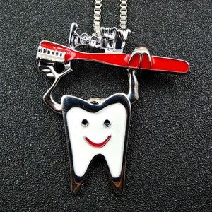 Tooth/Toothbrush Necklace